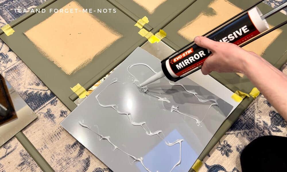 Applying mirror glue to the diy wood mirror