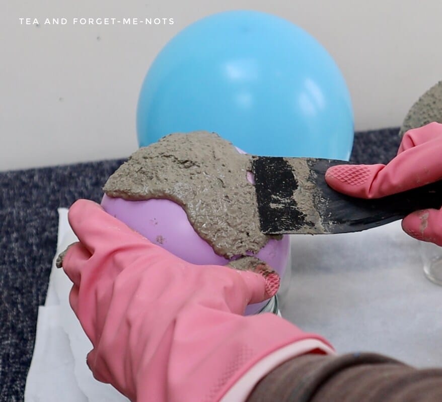 Applying the concrete to the balloon