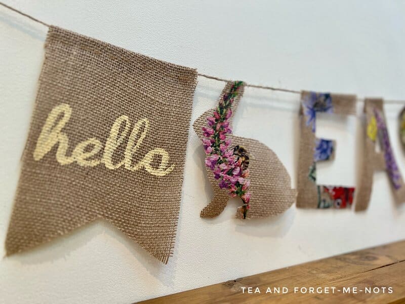 image shows a close up of burlap Easter garland.