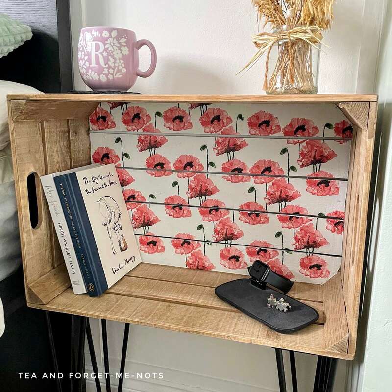 Close-up of fruit crate as bookshelf diy