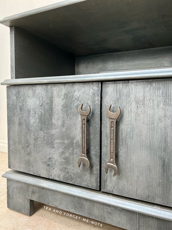 Close up of metal effect tv cabinet