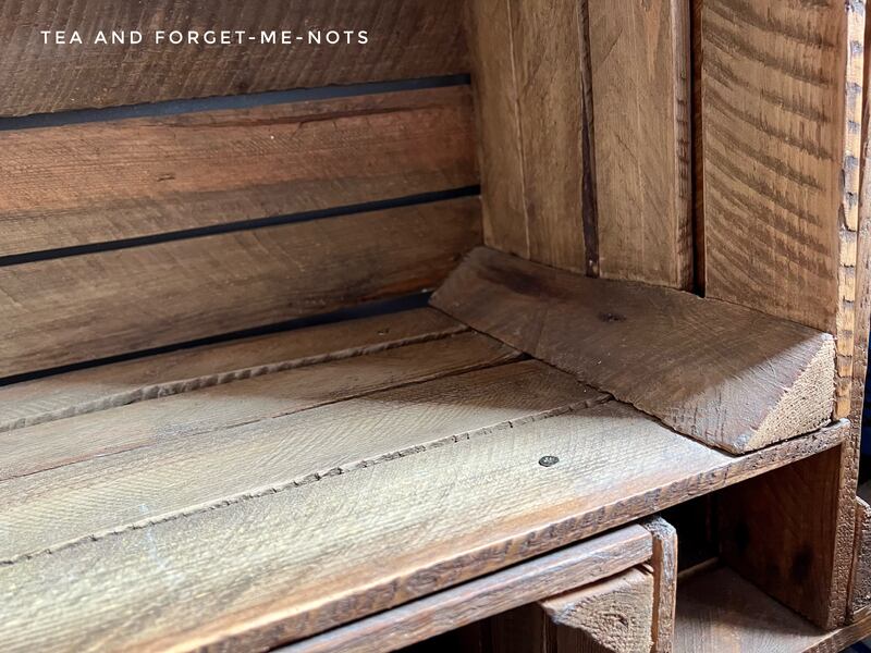 Crates attached together with wood screws