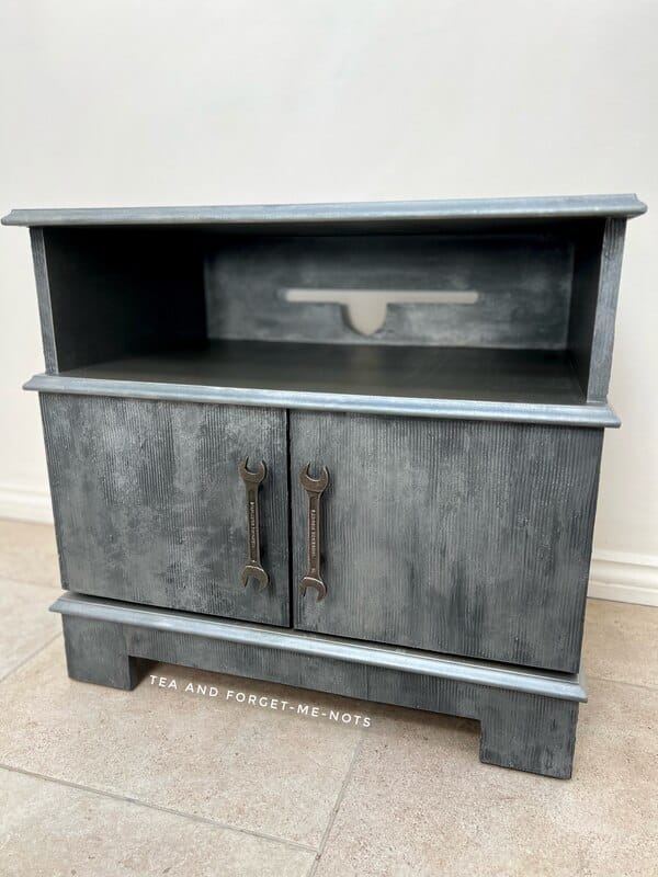 Faux metal finish tv cabinet.