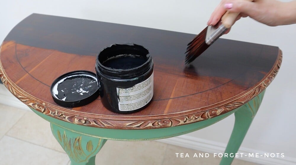 Painting the side table with anchor black paint