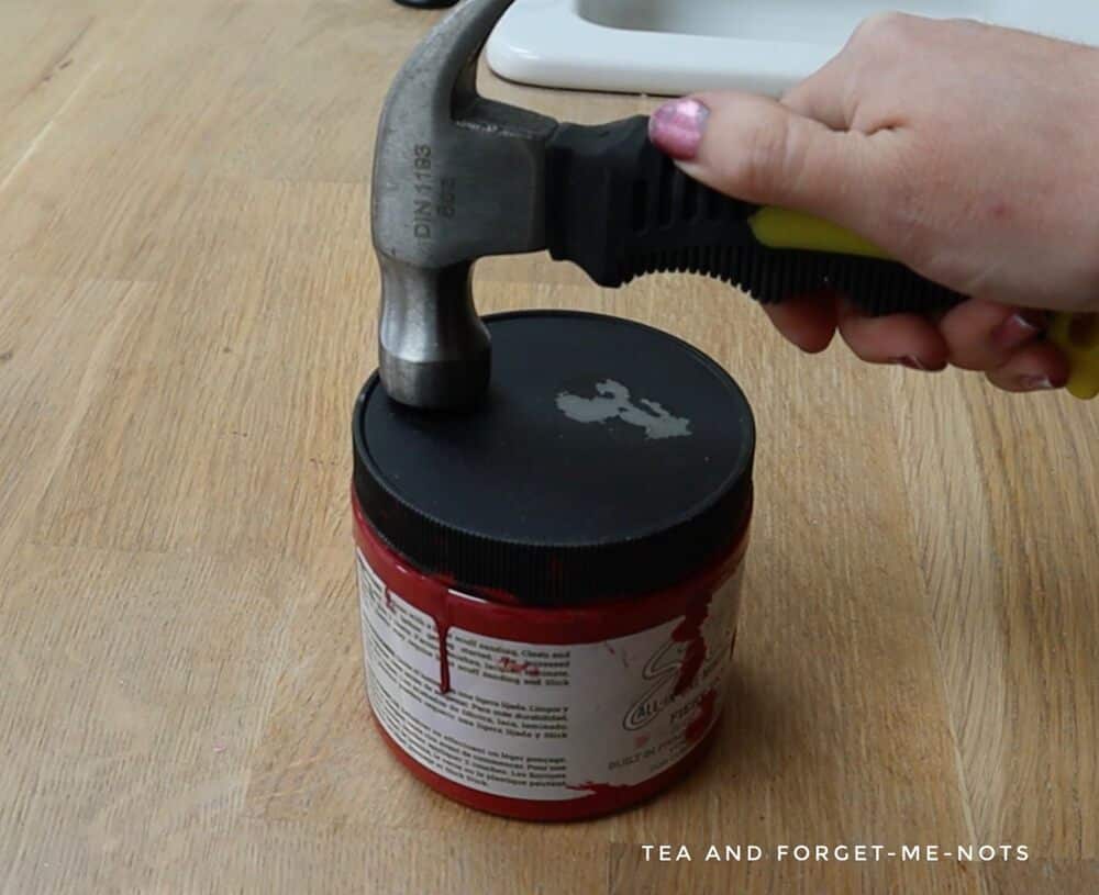 Remove paint lid with hammer