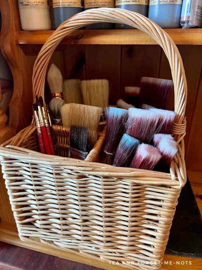 Store paintbrushes together in a separated basket