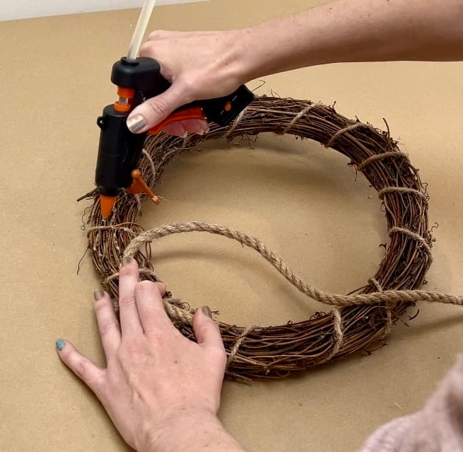 gluing rope to wreath