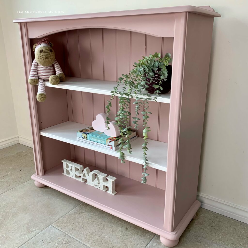 pink and white painted bookshelf idea