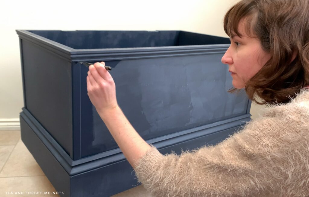 painting mdf chest with navy blue mineral paint.