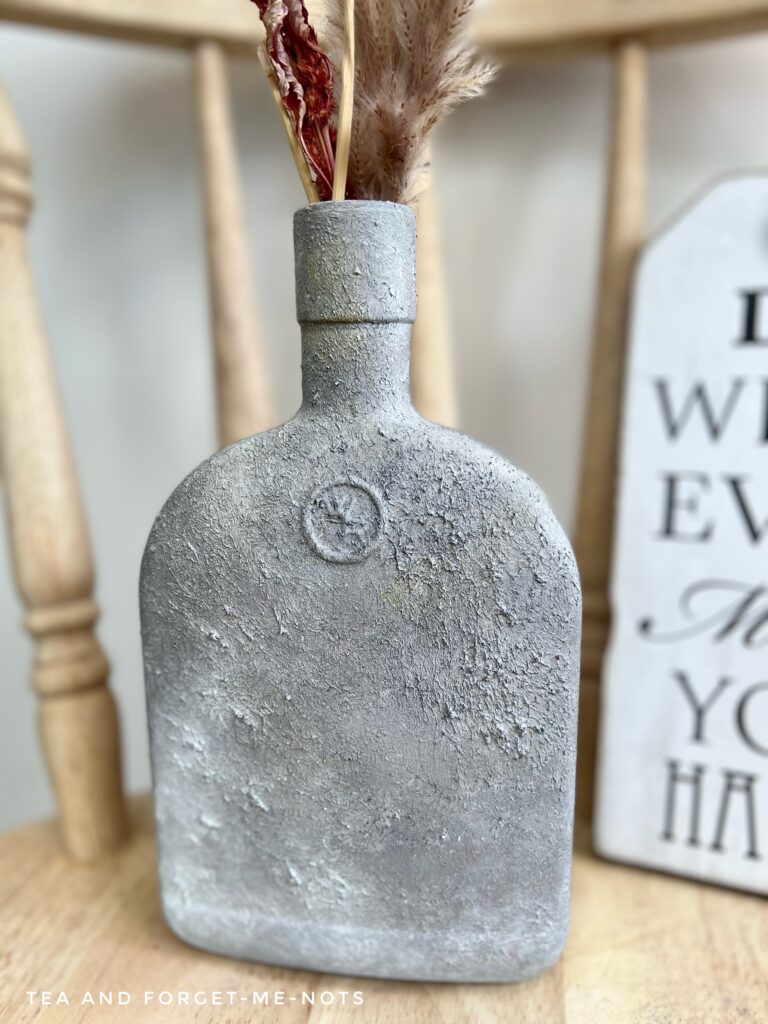 decorate glass bottles with paint - finished whiskey bottle