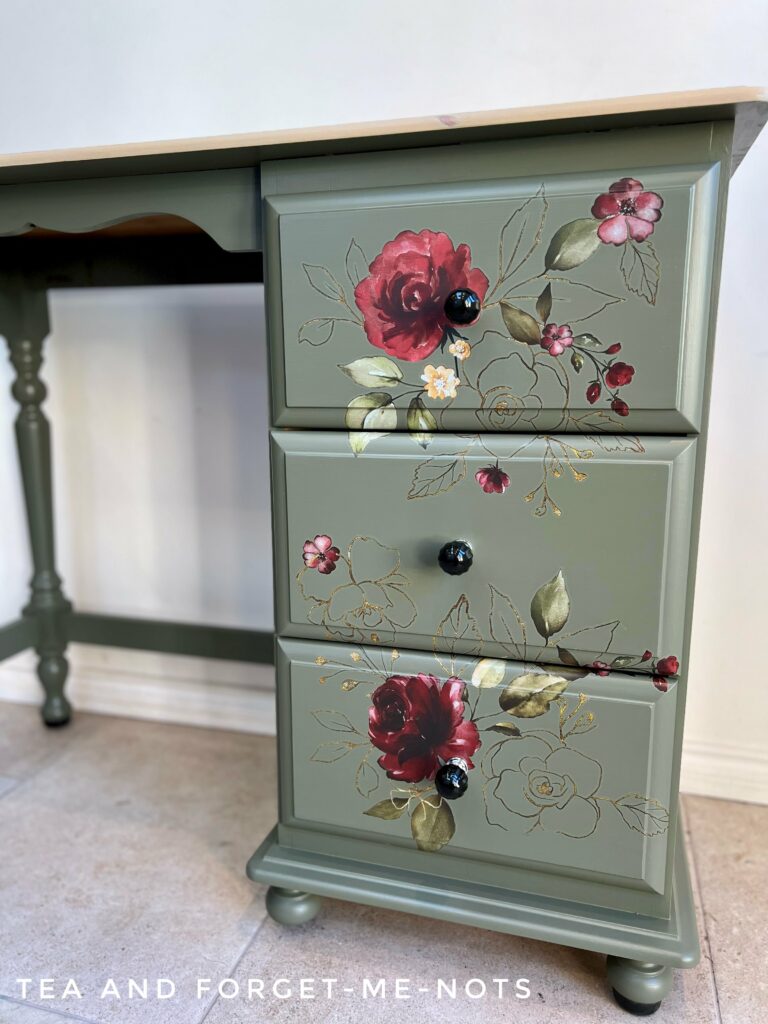 close up of painted desk drawers.