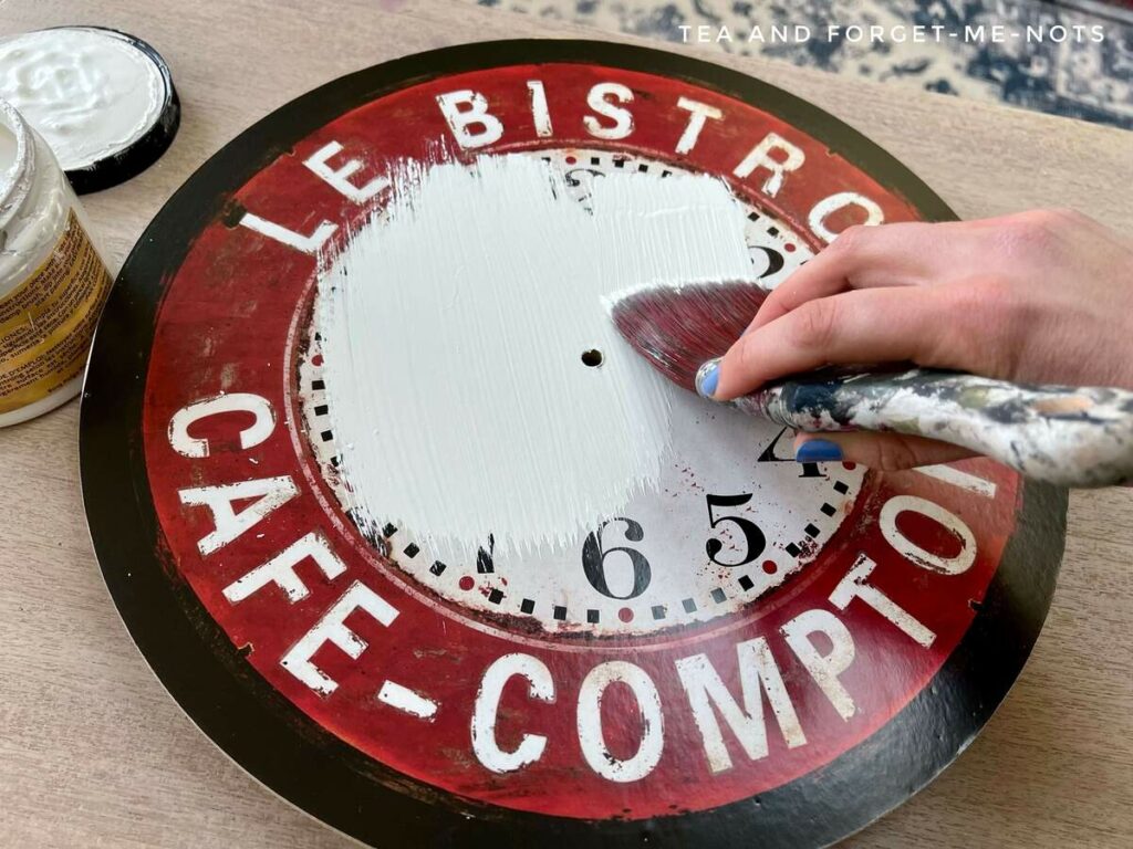 Painting over the original clock face image