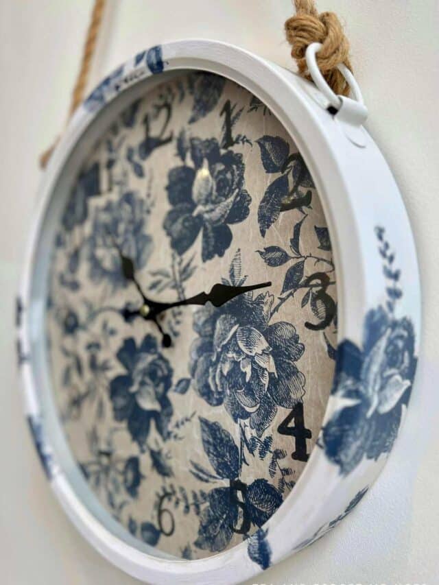 Close up of decoupaged clock.