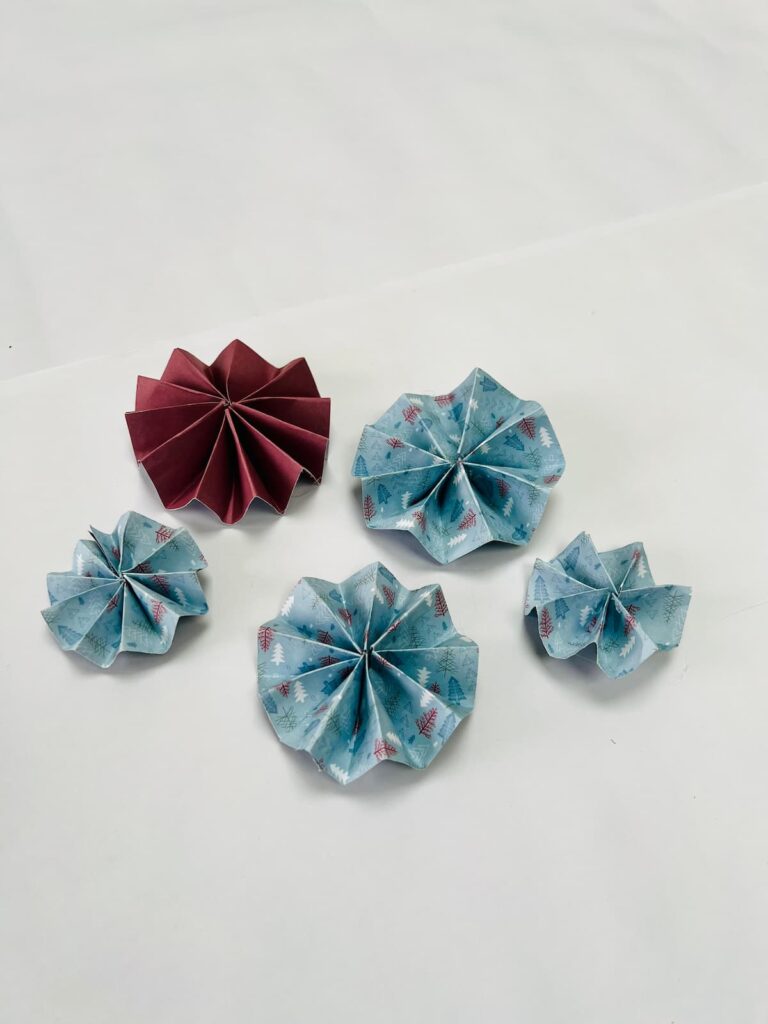 scrapbook paper folded into discs