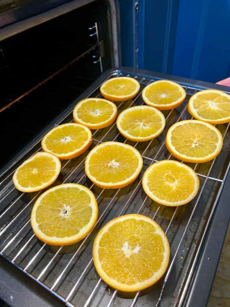 single layer of oranges on wire rack