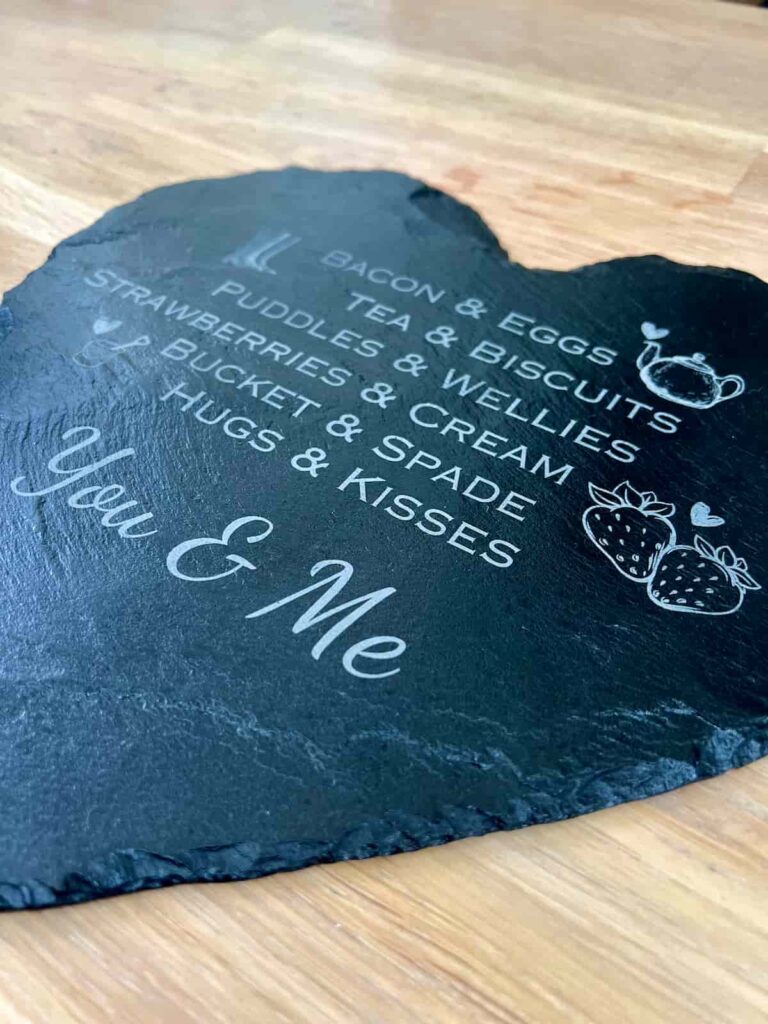 engraved slate heart close up.