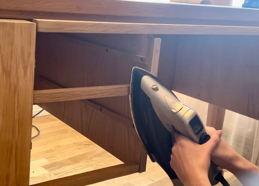 using iron to attach new veneer