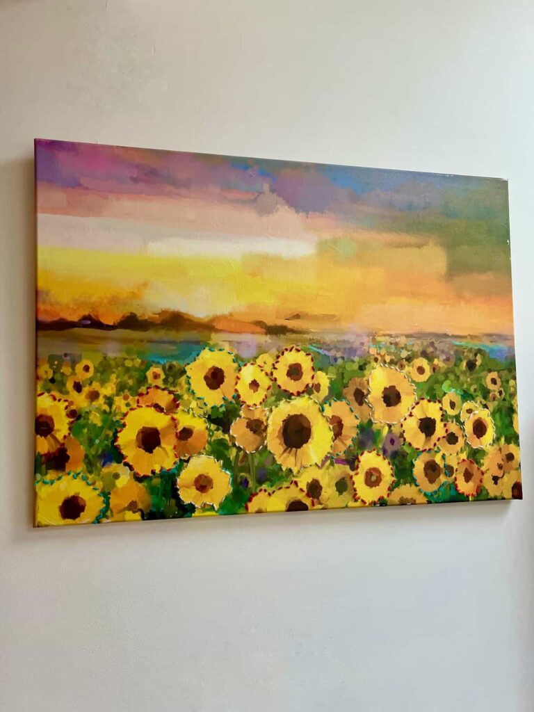 image of line art embroidery on canvas with sunflowers.
