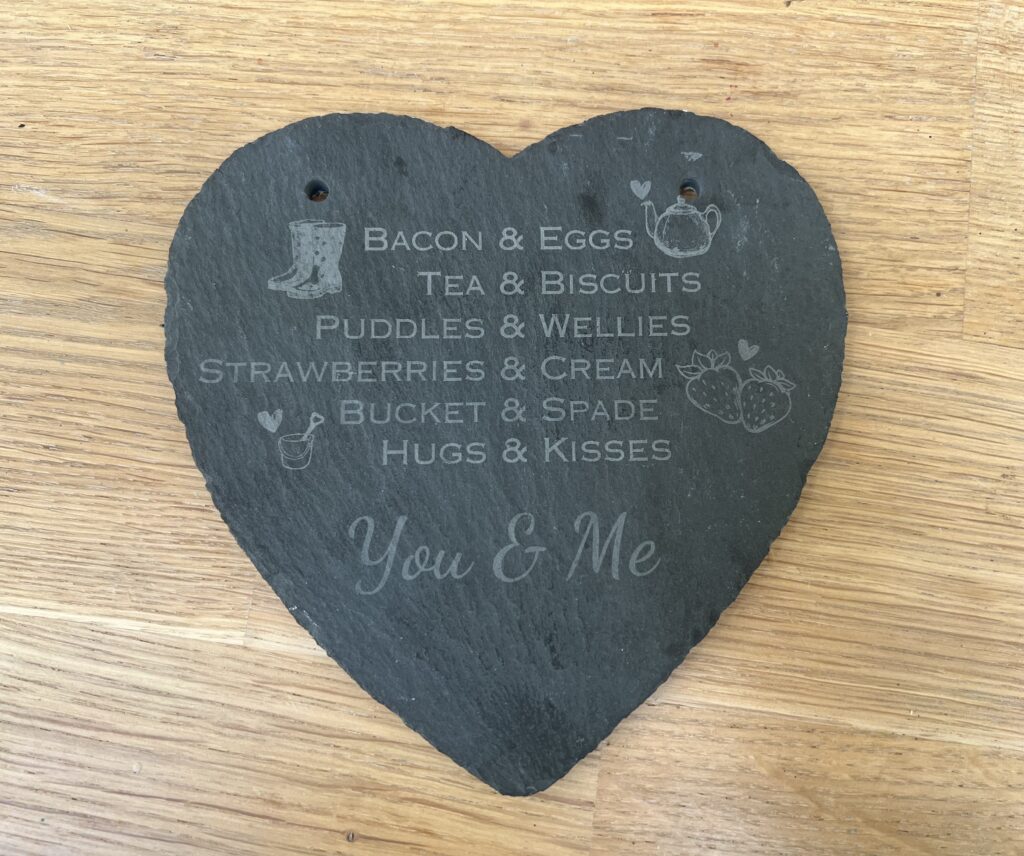 test engrave on slate heart.