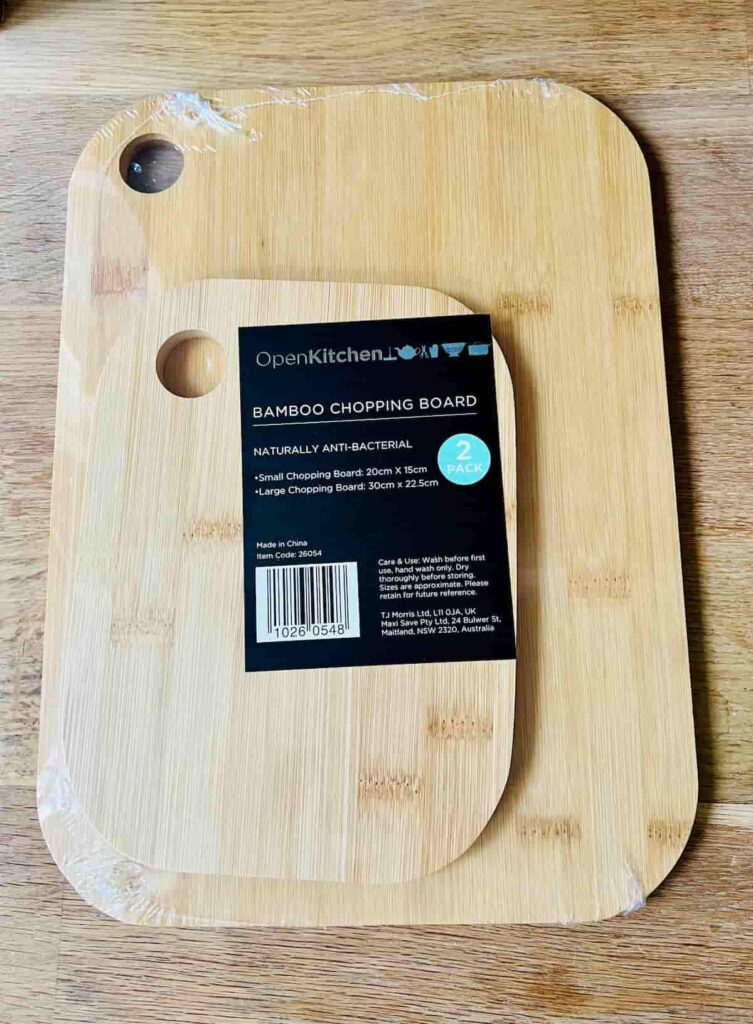 image shows pack of two bamboo chopping boards in packaging.