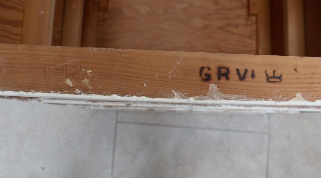 image shows 1942 engraved into the chest of drawers.