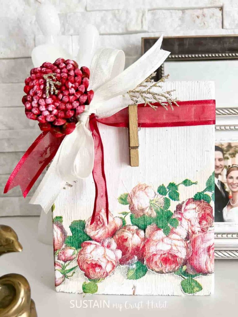 image shows wooden floral photo holder.