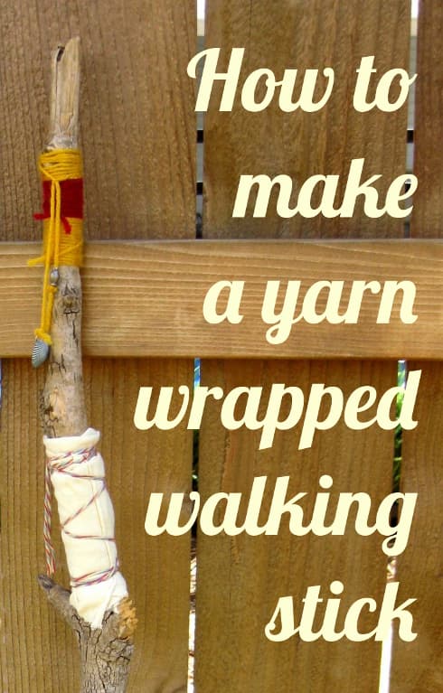 image shows walking stick wrapped with yarn.