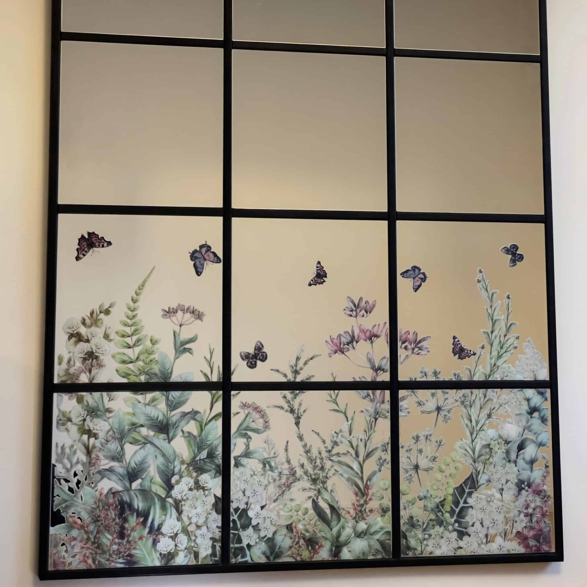 The final diy ikea mirror created with IKEA mirrors and floral transfer
