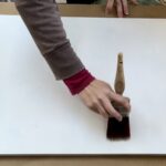 applying clear coat to canvas