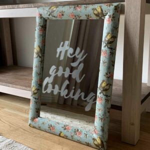 Final photo of charity shop mirror with hey good looking stencil