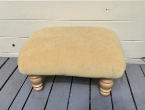 Photo of the charity shop piece in good condition - reupholster old footstool 