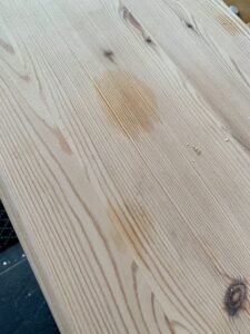 Oil stains on the raw wood