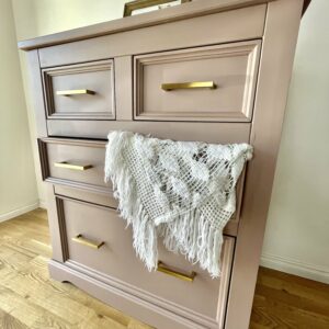 Side view of the finished pink chest of drawers