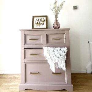 Front view of the finished pink chest of drawers 