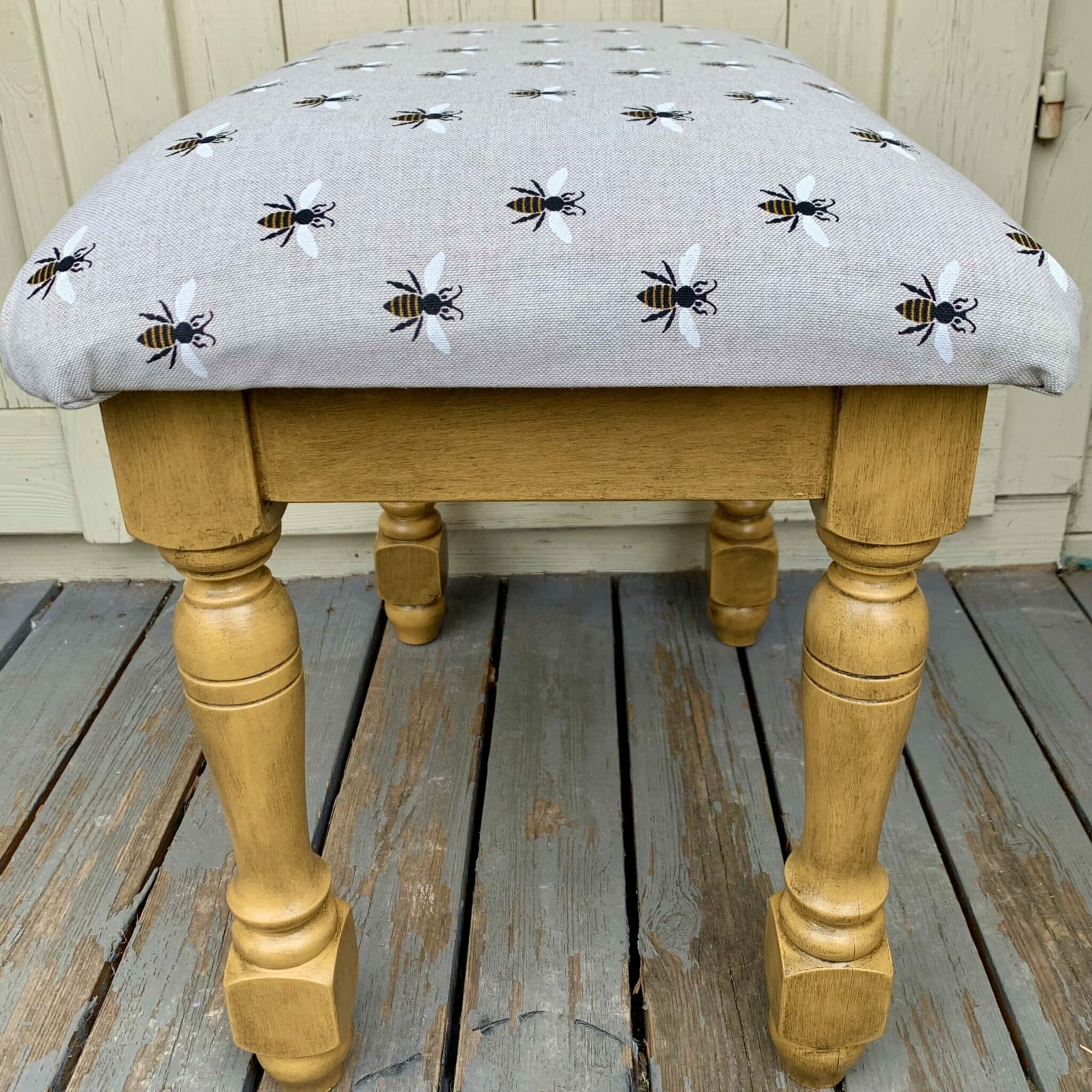 Black wax adding impact to a footstool
