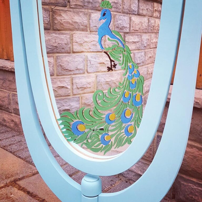 Close up of peacock mirror