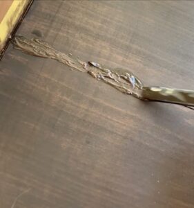Fix cracks in poor quality wood By mixing the stain and wood filler together 