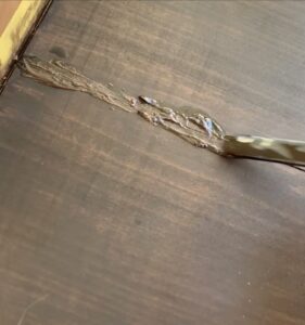 Fix cracks in poor quality wood By mixing the stain and wood filler together