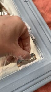 Razor blade and shaving foam on the mirror 