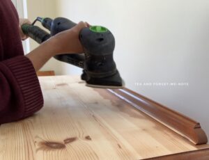 Sanding the shelves back to raw wood - best way to paint pine bookshelves 