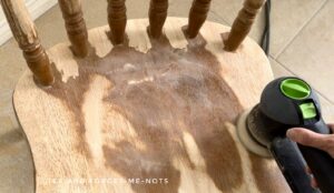 using an electric sander to remove varnish or paint from wood