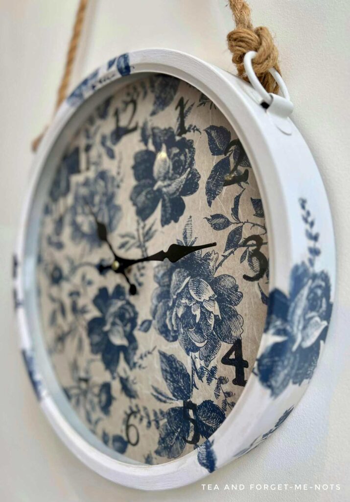 Close up of the wall clock with decoupage 