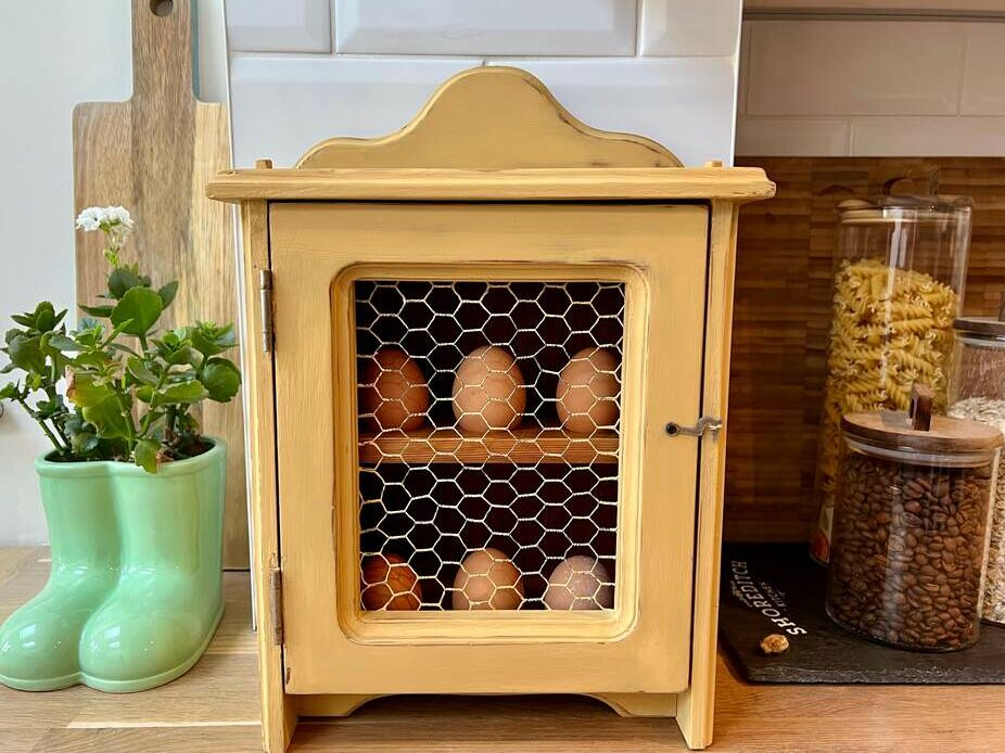 Egg house painted yellow clay paint