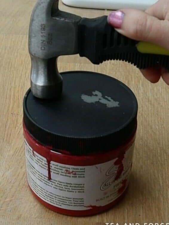 Remove paint lid with hammer