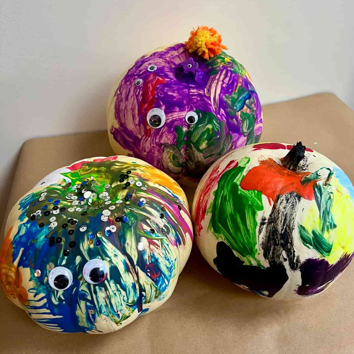 painting pumpkins with little kids