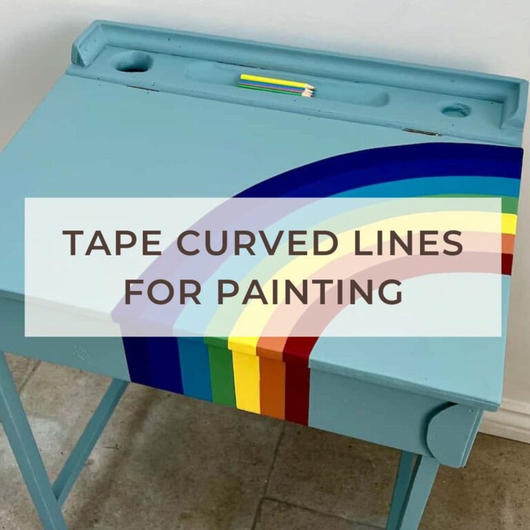 image shows blog post title of painted desk with rainbow.
