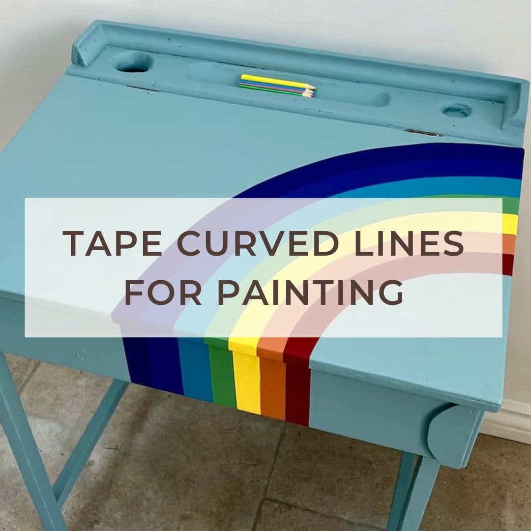 image shows blog post title of painted desk with rainbow.