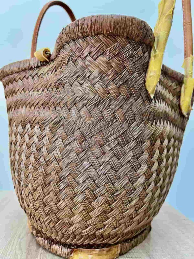 image shows brown stained basket.