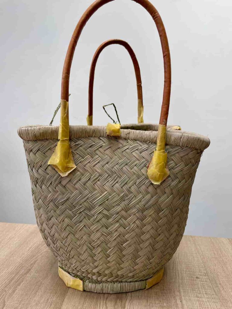image shows a basket bag stained natural.