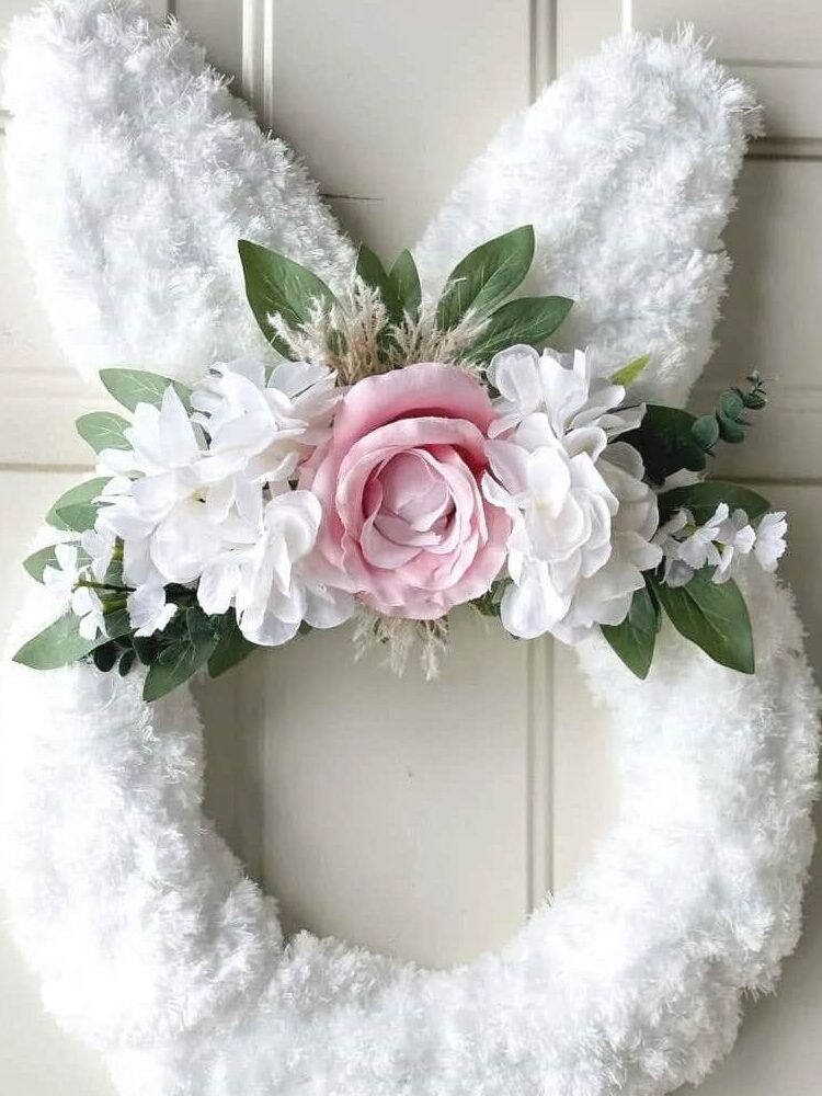 image shows white fluffy bunny wreath.